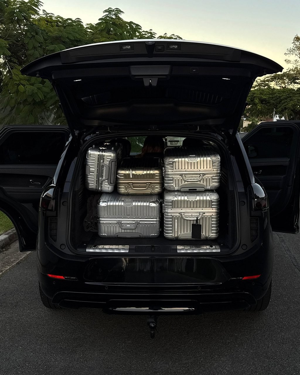 Luggage loaded into an SUV for an arrival in Aspen