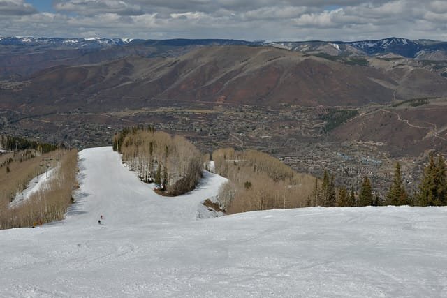 Spring skiing on Aspen Mountain, the valley below