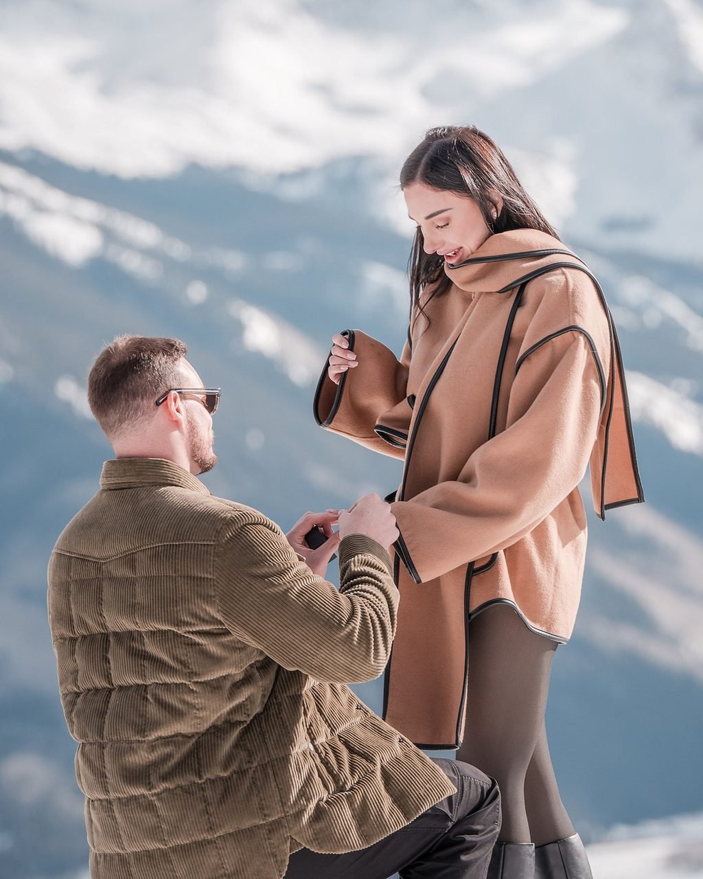 A proposal on an Aspen mountainside in winter