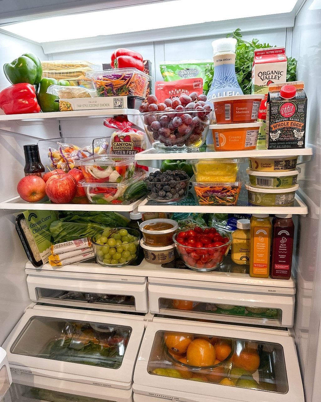 Groceries and provisions stocked in a residence refrigerator before arrival